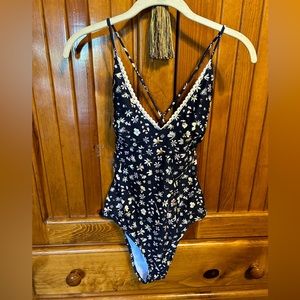 Size XL one piece flowered pattern with white lace trim